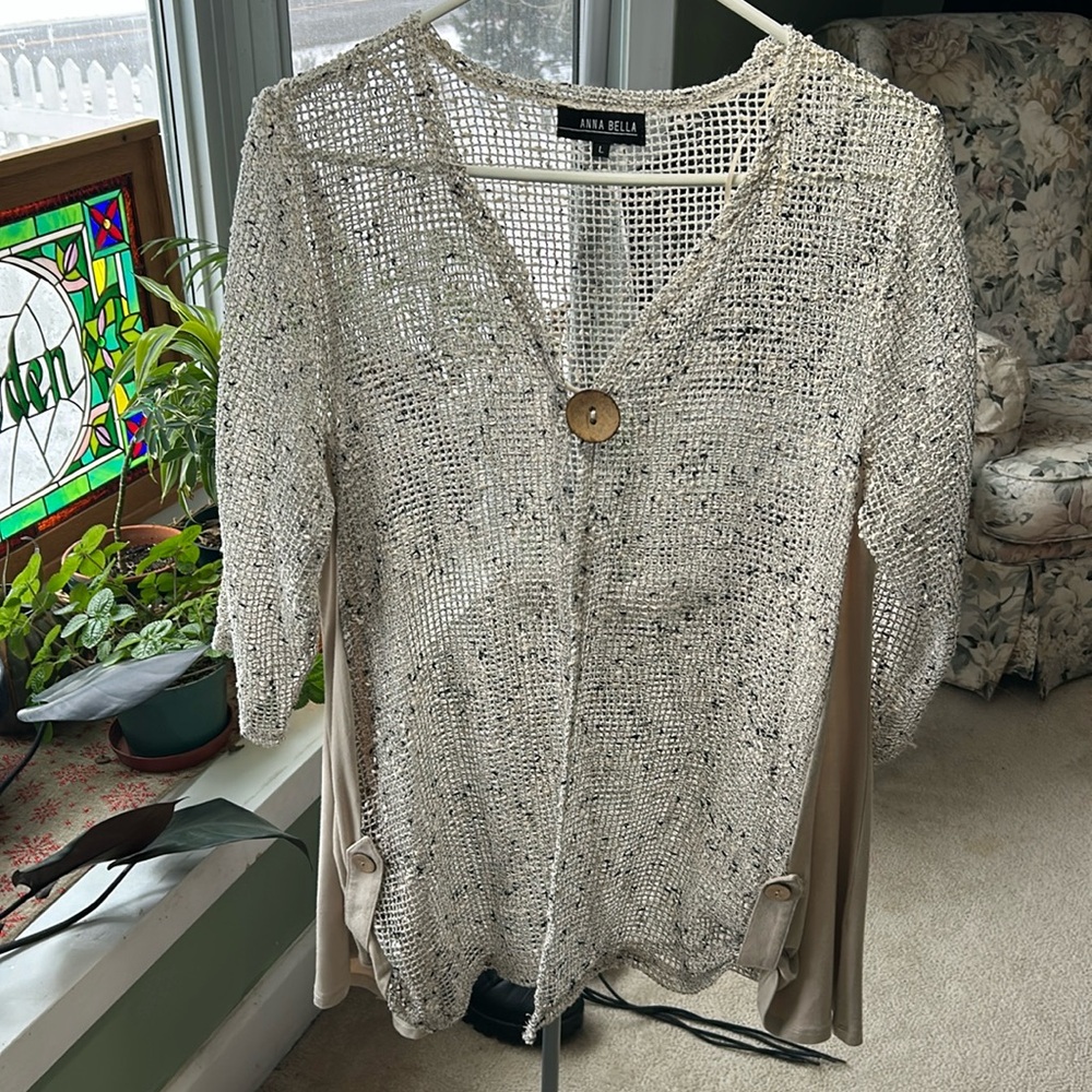 J66.   Large open knit cartigan